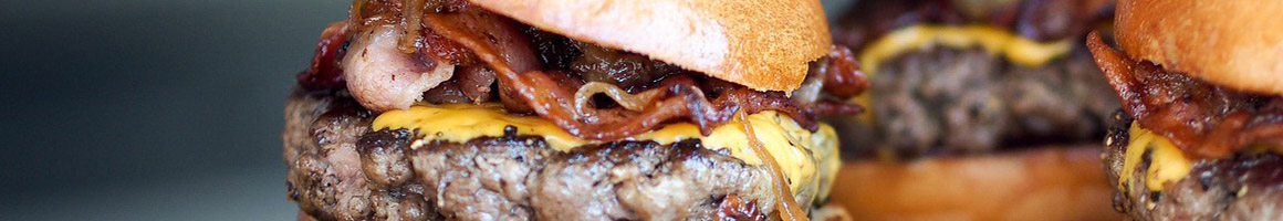 Eating Burger at 5 Napkin Burger restaurant in New York, NY.